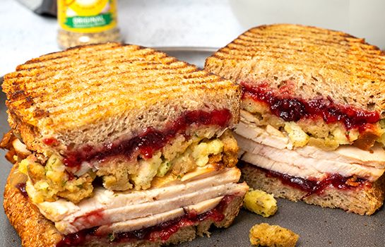 a cut in half sandwich sitting on top of a pan