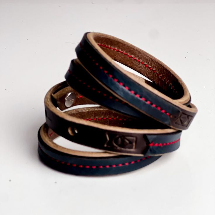 The Leather Wrap bracelets have been a top seller from the beginning. Choose from our everyday leather handbag leathers stitched to the top of our latigo wrap bracelets. Wear alone or layer them for the perfect arm party---these pieces are sure to be a favorite! Layer them all! -Bracelet wraps twice around wrist -3 adjustable sizes Leather Bracelets With Wrist Strap As Fashion Accessory, Everyday Double Band Leather Bracelet, Everyday Braided Leather Bracelet, Everyday Black Leather Bracelet, Handmade Adjustable Leather Wrap Bracelet, Leather Bracelet With Wrist Strap For Everyday Use, Handmade Leather Wrap Bracelet Gift, Handmade Leather Wrap Bracelet For Gift, Minimalist Leather Bracelets With Leather Strap