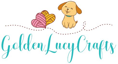 a dog sitting next to a ball of yarn with the words golden lacy crafts on it