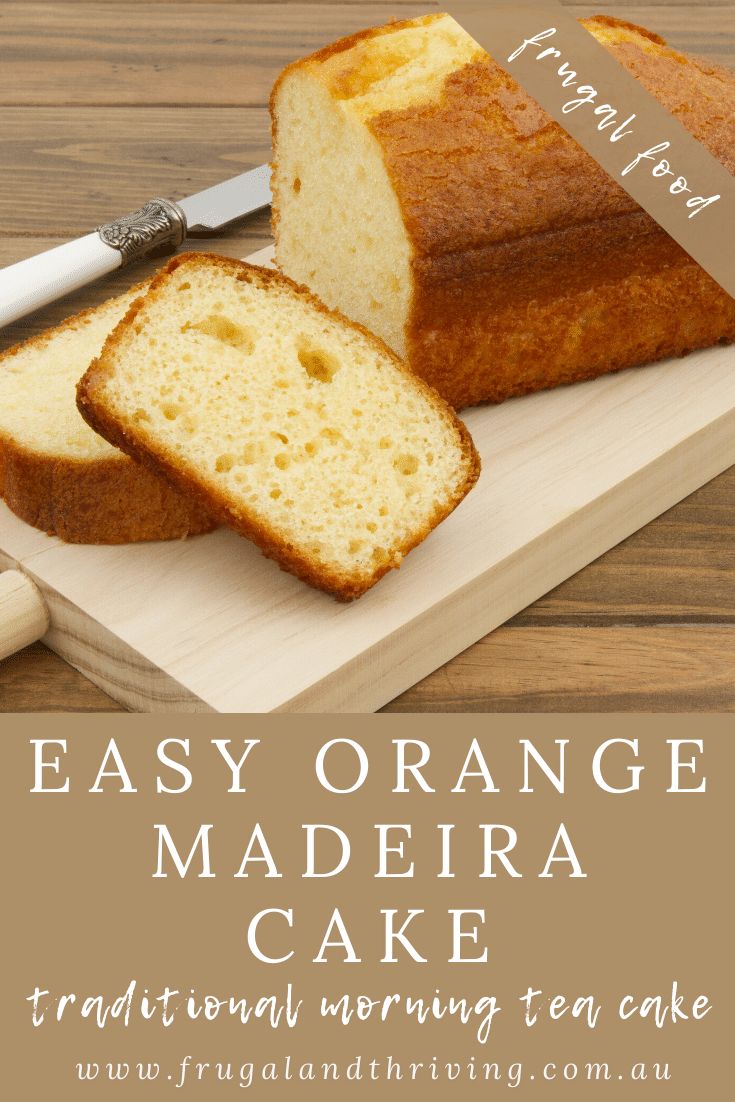 an easy orange madera cake is cut into slices on a cutting board