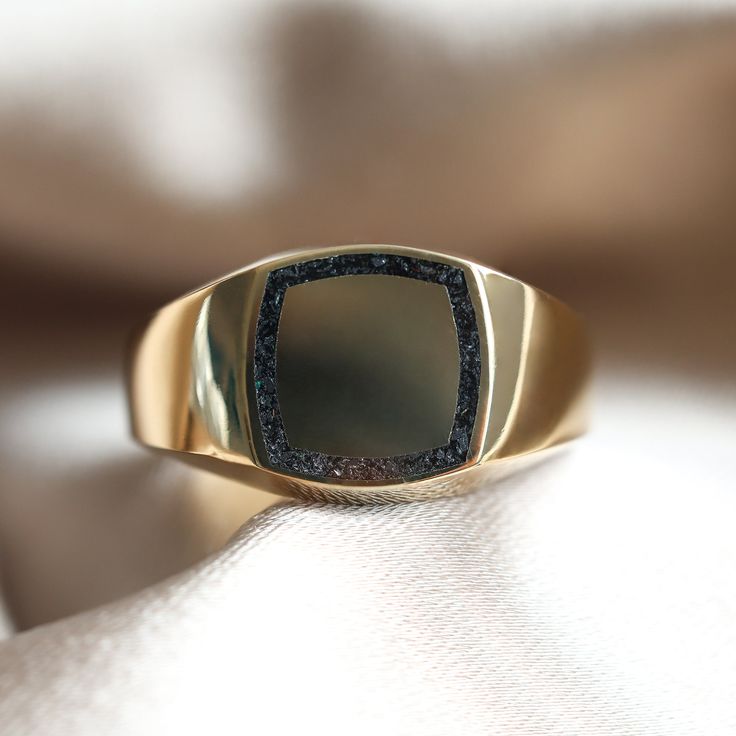 BRAD CRUSHED LAPIS SIGNET RING Unique black spinel signet ring, makes a perfect gift for him DETAILS  Gemstone: crushed black spinel  Style: Inlay Band width: approx. 13mm in the front 2,8mm at the back  Finish: Polished
   Material:14k Gold: yellow, white, rose  18k Gold: yellow, white, rose  Other Metal: platinum  Sizing: We are using US metric system   CUSTOMIZATION OPTIONS This design can be made with gemstones of your choosing. If you would prefer a custom ring, please contact us before pur Fine Jewelry Polished Finish Signet Promise Ring, Black Signet Ring With Polished Finish For Promise, Modern Gold Signet Promise Ring, Modern Gemstone Signet Ring For Formal Occasions, Gold Gemstone Signet Ring For Formal Occasions, Luxury Gemstone Signet Ring For Promise, Luxury Spiritual Signet Ring For Wedding, Modern Black Enamel Signet Ring For Anniversary, Modern Tarnish Resistant Signet Ring Gift