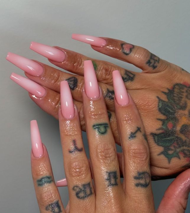 These nails showcase a soft and elegant baby pink shade, perfect for a minimalist yet chic look. The solid pink color is timeless and versatile, making it a great choice for any occasion. Fall Coffin Nail Designs, Fall Coffin Nail Ideas, Milky White French, Fall Coffin Nails, Pink Black Nails, Baby Pink Nails, Solid Color Nails, Airbrush Nails, Glow Nails