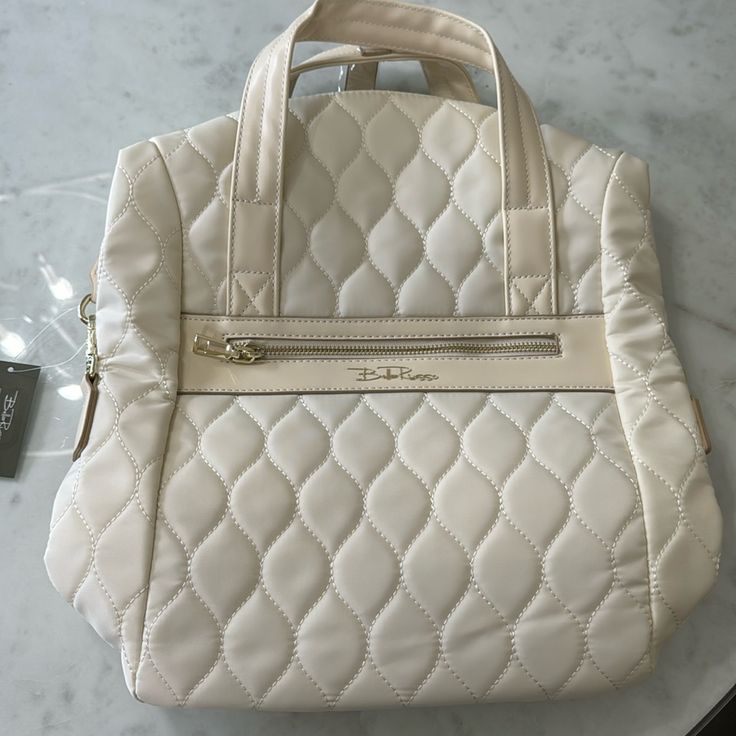 Brand New Never Been Worn Bella Russo Quilted Shoulder Bag/Backpack Luxury Cream Bag With Zipper Closure, Elegant Top Handle Backpack For Shopping, Cream Double Handle Bag With Zipper Closure, Cream Double Handle Bag With Zipper, Elegant Crossbody Backpack With Zipper, Elegant Cream Satchel With Zipper Closure, Cream Satchel With Zipper For Travel, Cream Satchel With Zipper Closure For Travel, Cream Satchel For Travel With Zipper Closure