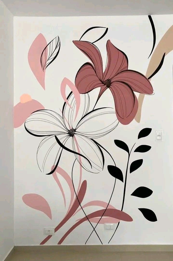 the wall is painted with flowers and leaves in pink, black, white and grey colors