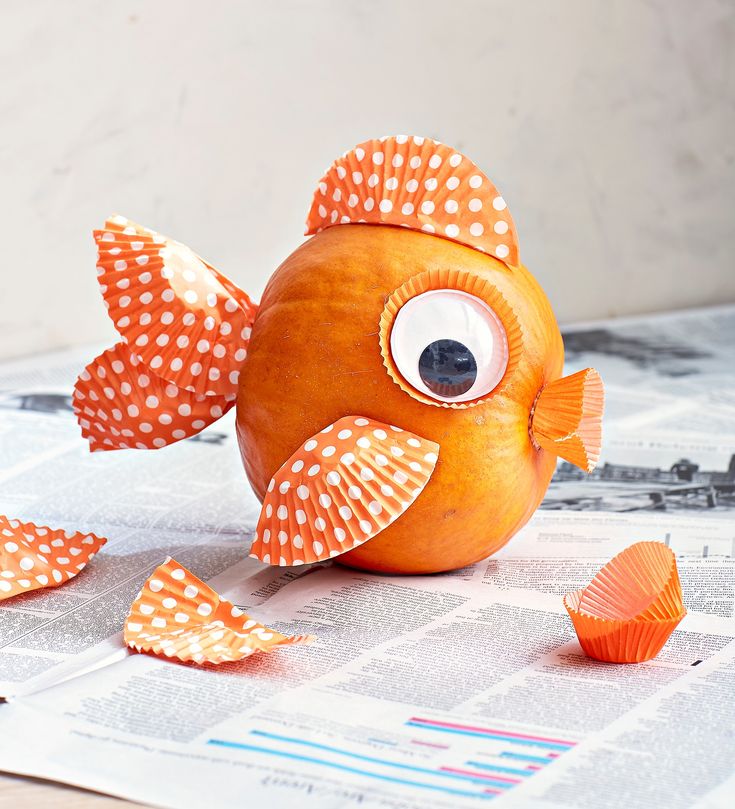 an orange fish with big eyes and polka dots on it's body is shown in the instagram