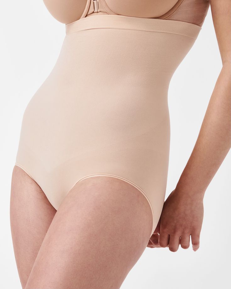 Lightweight, breathable, and center-seam free, our SPANXsculpt™ Seamless Power High-Waisted Brief is engineered for comfortable, 360-degree sculpting. Made with 4-way stretch, it blends powerful sculpting with an ultra-light feel, and is designed to be your new favorite shapewear essential. Perfect for everyday wear or special occasions, it goes undetected under clothing. Yep, no VPL (visible panty line) here! | Spanx Women's SPANXsculpt Seamless Power High-Waisted Brief Seamless Sculpting Shapewear, Supportive Seamless Sculpting Shapewear, Supportive Sculpting Seamless Shapewear, Supportive Seamless Full Coverage Shapewear, Supportive Full Coverage Seamless Shapewear, Solid Sculpting Shapewear With Seamless Construction, Seamless Sculpting No-show Shapewear, Seamless Compressive Full Coverage Shapewear, Light Support Stretch Shapewear With Full Coverage