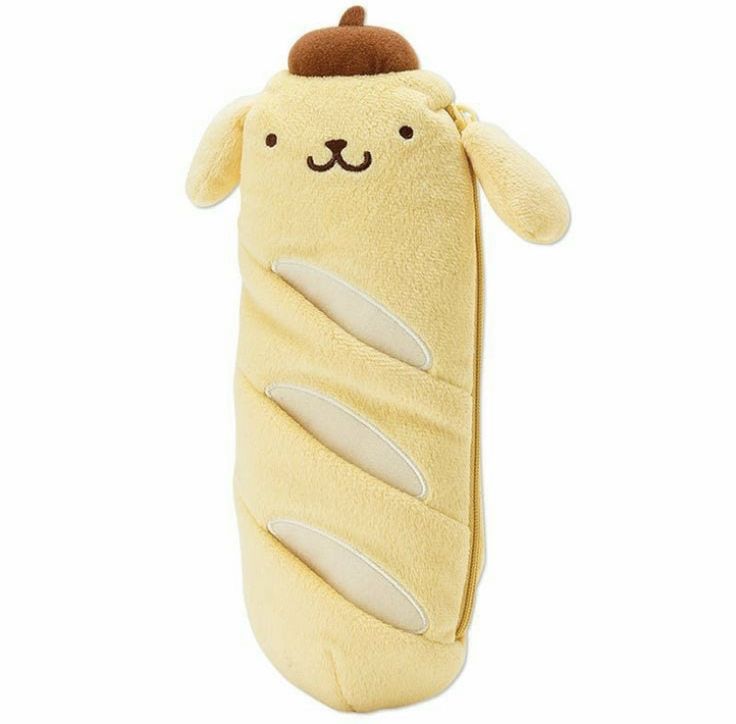 a yellow stuffed animal wrapped in a blanket