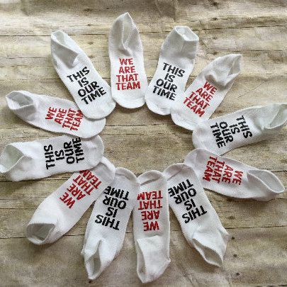 six pairs of socks with words on them that say, this is what she said