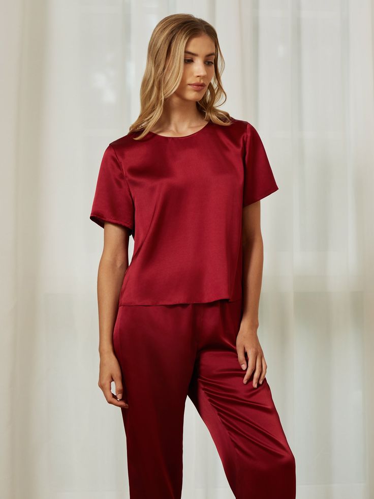 Made from high-quality silk fabric, the pajama set offers a sumptuously soft feel against your skin, ensuring a restful and indulgent night's sleep. · Made of 100% pure silk· Style: 2-piece Silk Pajama Set· Top: Drop-shoulder design· Pants with elastic waistband Red Silk Pjs, Silk Pijamas Pants, Silk Pajamas Short Sleeve, Elegant Silk Sleepwear With V-neck, Silk V-neck Sleepwear For Bedtime, Hot Gifts, Silk Pajama Set, Gift Season, Family Event