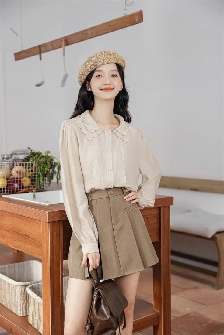 Button up shirt with a double scalloped collar, scallop trim placket details and long blouson sleeves. S: 15" across shoulders, 38.5" chest, 24.5" lengthM: 15.5" across shoulders, 40" chest, 24.5" lengthL: 16" across shoulders, 41.5" chest, 25" lengthXL: 16.5" across shoulders, 43" chest, 25" length Scalloped Collar, Scallop Trim, Shoe Gifts, Overall Dress, Sweater Blouse, Cardigan Jacket, Button Up Shirt, Jeans Pants, Up Shirt