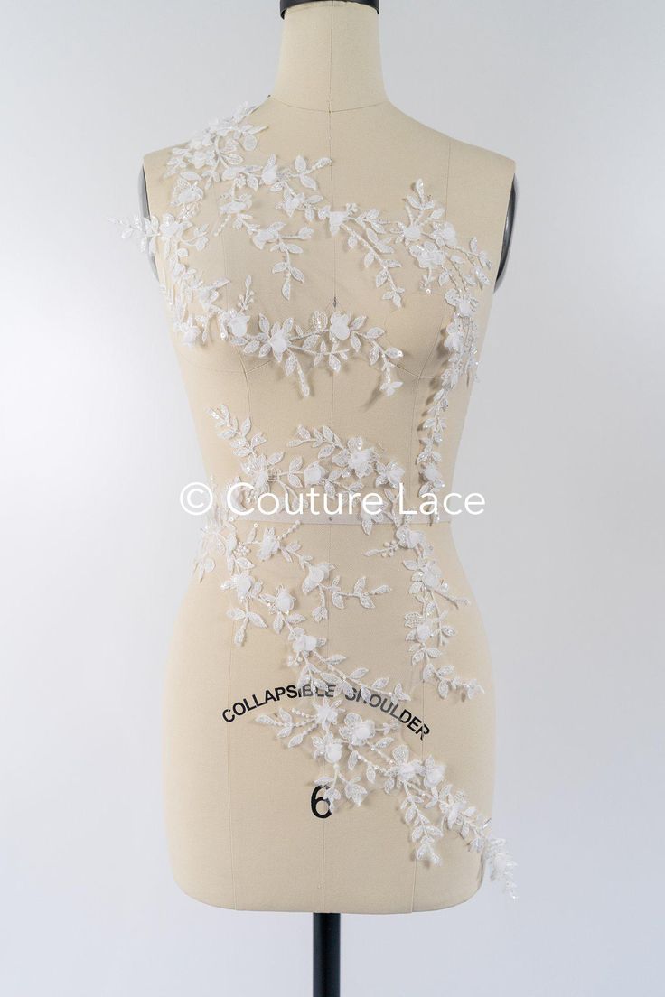 Add a touch of elegance to your special day with our finely embroidered lace patches made from high-quality cotton yarn. The delicate, floral designs of our floral lace appliqués are perfect for wedding dresses, christening dresses and romantic wedding decorations. Each lace patch is a small work of art that will transform your creations into something unique. Our bridal lace appliqués will make your big moment even more magical. Discover the variety in our online shop now! ❀❀ DETAILS ❀❀ Colour: Elegant Lace Fabric With 3d Embroidery, Elegant Fitted Dress With Appliques, Elegant Embroidered Fitted Lace, Elegant Fitted Embroidered Lace, Elegant Cream Embroidered Fabric With 3d Embroidery, Fitted Embroidered Cream Lace, Elegant Wedding Dress With Floral Applique, Fitted Cream Embroidered Lace, Cream Embroidered Fitted Lace