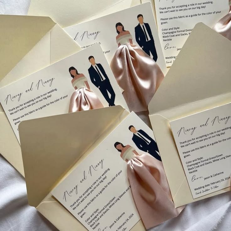 the wedding stationery is laid out on top of each other