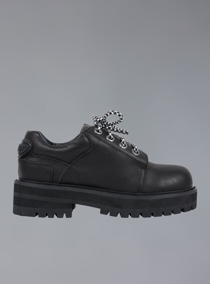 The Zoe Shoe has all the toughness of a work boot, but requires, nor expects ANY work to be done in them whatsoever. All leather upper with padding at the ankle and tongue, a rounded toe, branded rubber UNIF patch at the back, and two sets of laces, one black, and one black/white pattern. The sole is a durable rubber stacked from 1" at the front to 1.5" at the heel. Click Here for a printable size chart (make sure you print at Actual Size to ensure accuracy) For any questions about sizing please Black White Pattern, Work Boot, Secret Sale, Off Black, White Patterns, Work Boots, Shoe Sale, Shoe Shop, Oxford Shoes