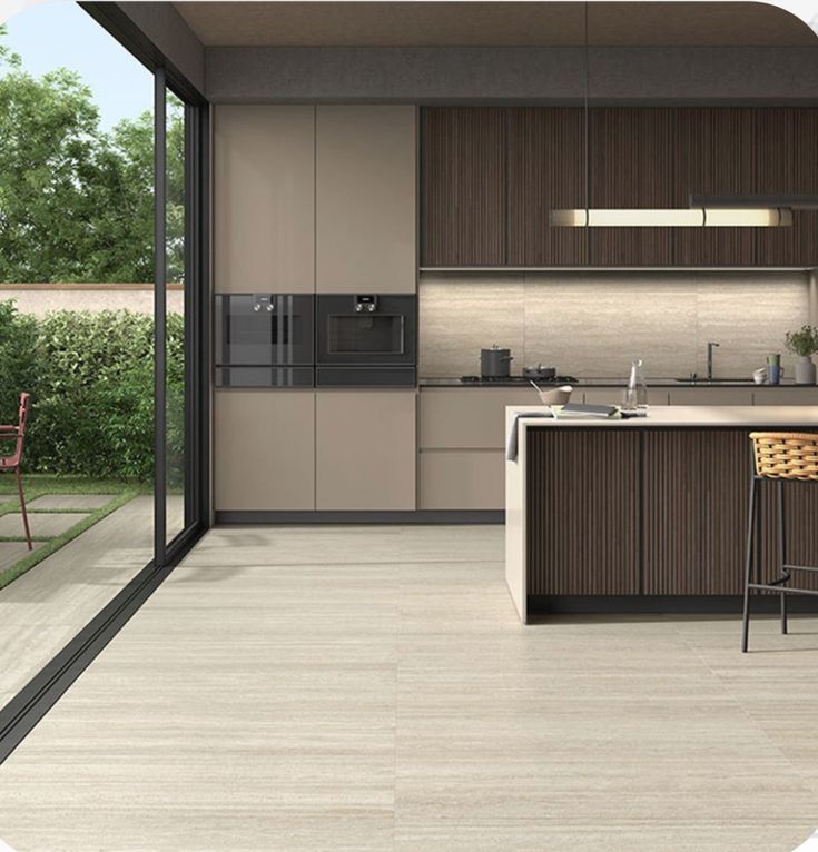 a modern kitchen with an island counter and bar stools