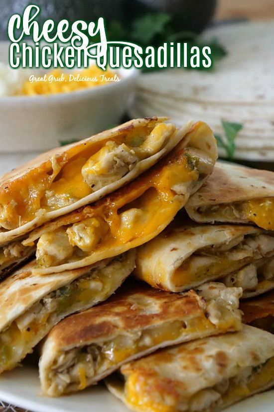 some quesadillas stacked on top of each other with cheese in the middle