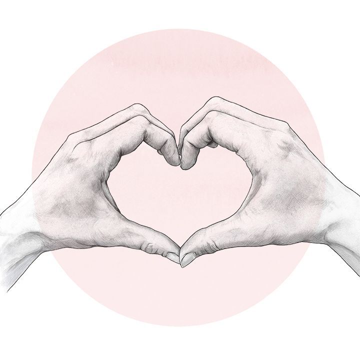 two hands making a heart shape with their fingers