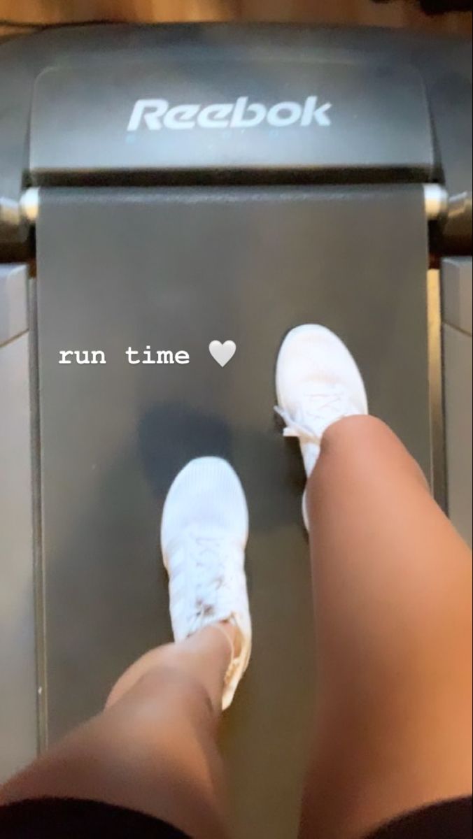 someone is standing on a treadmill with their feet in the machine that reads, run time