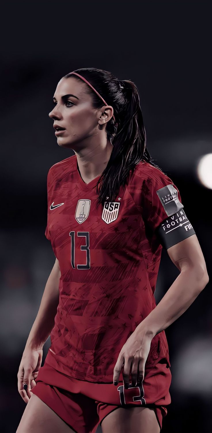 a female soccer player in a red uniform