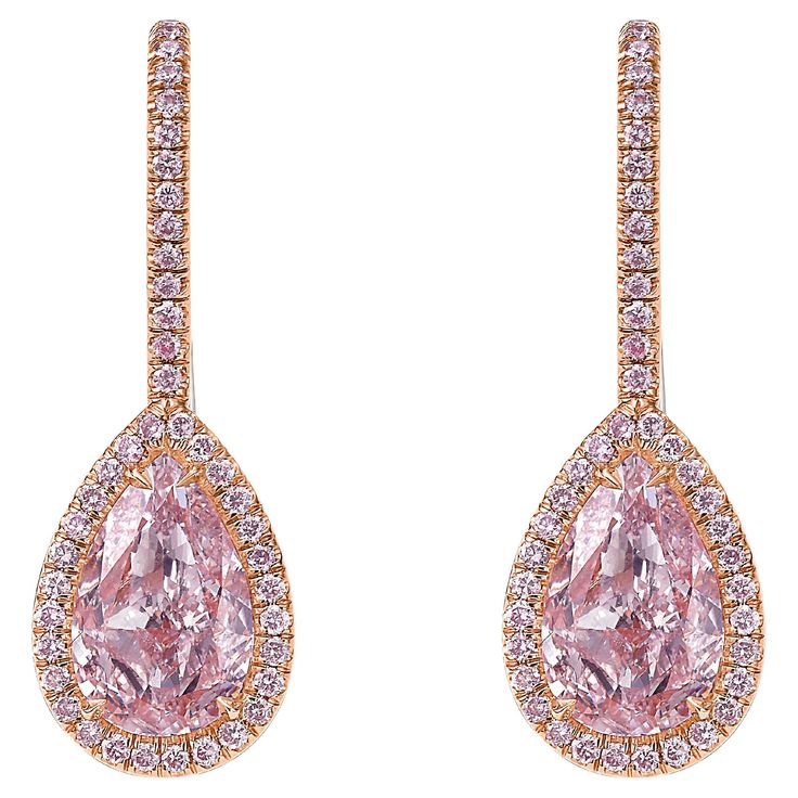 2.02 and 2.22 Carat Center Diamonds Light Pink Pear Shapes VS1 and VS2 0.42 Carats of Surrounding Pink Diamonds Excellent + Very Good cutting Set in 18k White Gold with 14k Rose Gold plating GIA Certified Diamonds Handmade in NYC This piece can be viewed before purchase in our showroom in NYC, or at one of our retail partners throughout the country, please inquire for more info. Appraisals can be done on all purchases. We use the best jewelers in New York and can redesign any piece to your likin Kylie Birthday, Pear Shapes, Rare Colors, Pink Diamonds, Pear Diamond, Diamond Drops, Diamond Drop Earrings, Fancy Color Diamonds, Gia Certified Diamonds