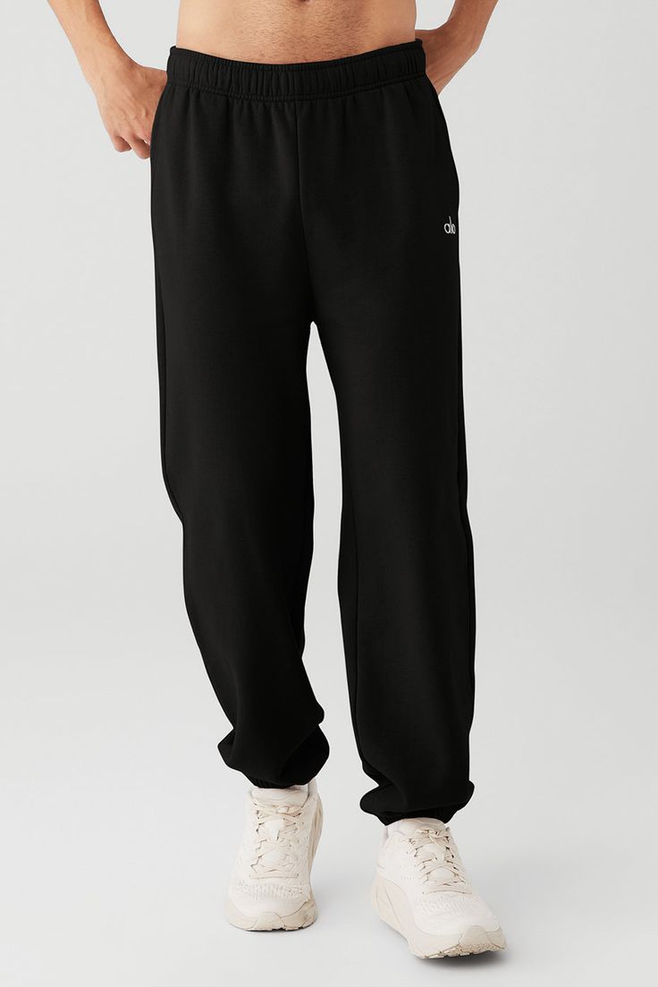 We’re all about the Accolade Sweatpant — it’s a super soft, leveled-up classic with a chrome Alo logo detail and powerful, performance tech for studio & street. Wear it in cold weather with a bold jacket and transition to warmer weather with slides. Super-soft diagonal French terry For chill time or to-and-from Unisex style Designed to work from studio to street Wear-tested by our in-house team for the perfect fit Oversized Comfortable Joggers For Leisure, Comfortable Oversized Joggers For Leisure, Comfortable Black Sweats For Lounging, Black Sweats With Comfort Waistband For Loungewear, Black Comfort Waistband Sweats For Loungewear, Oversized Sporty Joggers For Lounging, Black Sweatpants With Elastic Cuffs For Streetwear, Oversized Solid Joggers With Elastic Waistband, Oversized Casual Joggers With Elastic Waistband