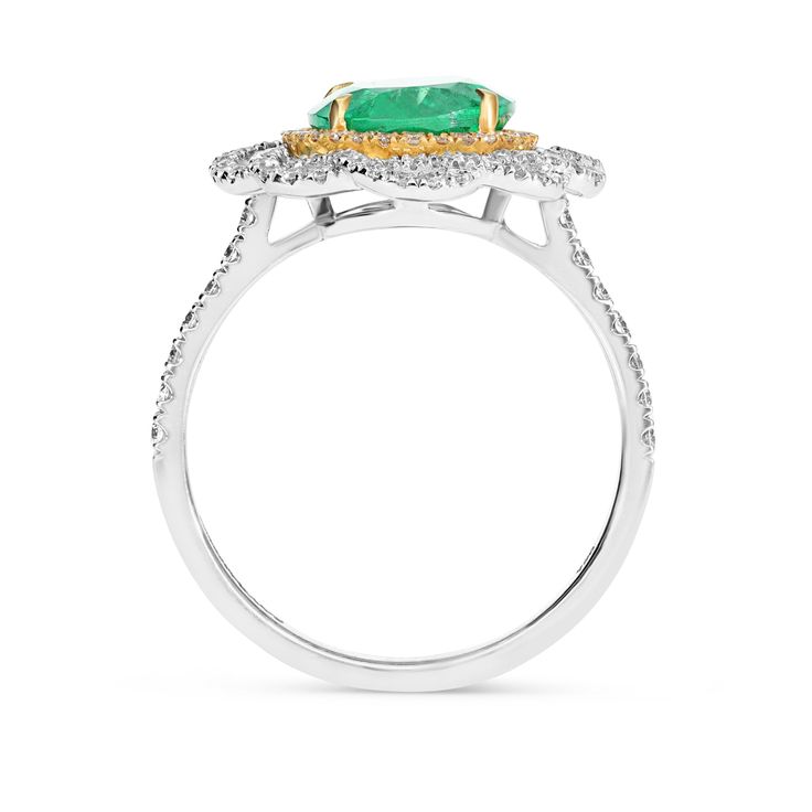 18K White and Yellow Gold Emerald & Diamond Flower Shaped Cocktail Ring A thoughtful gift for the May birthday girl. This gorgeous birthstone ring showcases an Oval cut natural emerald center stone wrapped in yellow gold and a sparkling white diamond-lined halo. A braided pave frames the center stone crafting a flower design for extra shine and sparkle. Dazzle your friends and family on every occasion by wearing this unique, feminine, handmade piece. Available in sizes, send us yours! 2.48 c Oval Emerald Rings With Pave Setting, Oval Emerald Ring With Pave Diamond Setting, White Gold Emerald Ring With Pave Setting, Oval Shape, Oval Emerald Ring With Diamond Pave Setting, Oval Emerald Ring With Pave Setting For Anniversary, Oval Emerald Ring With Pave Setting, Exquisite Pave Setting Emerald Anniversary Ring, Oval Halo Emerald Ring For May Birthstone, Emerald Ring With Pave Setting For May Birthstone Anniversary