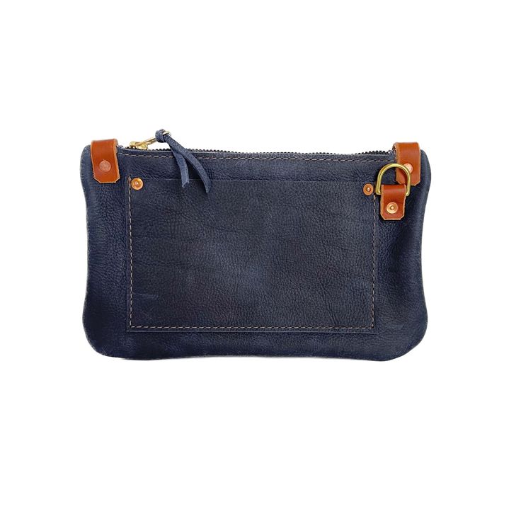 The Micro Messenger in Navy Smaller than its predecessors, the Micro Messenger Bag can be used as a shoulder bag as well as a clutch with its detachable shoulder strap. This sleek and soft bag comes standard with a shoulder strap. The Micro is the perfect accessory to your daily routine. Longer crossbody straps are available under accessories. This soft, full-grain, oil tanned leather is infused with oils and waxes to create a patina as durable as it is stunning. This bag is made with a beautifu Daily Use Clutch Shoulder Bag With Zipper Pocket, Daily Use Shoulder Bag Clutch With Zipper Pocket, Everyday Satchel Clutch With Adjustable Strap, Daily Use Tote Clutch With Leather Handles, Everyday Use Rectangular Clutch With Leather Handles, Everyday Carry Pouch Shoulder Bag With Zipper Pocket, Pouch Shoulder Bag With Zipper Pocket For Everyday, Leather Wallets With Removable Pouch For Everyday Use, Leather Wallet With Removable Pouch For Everyday Use