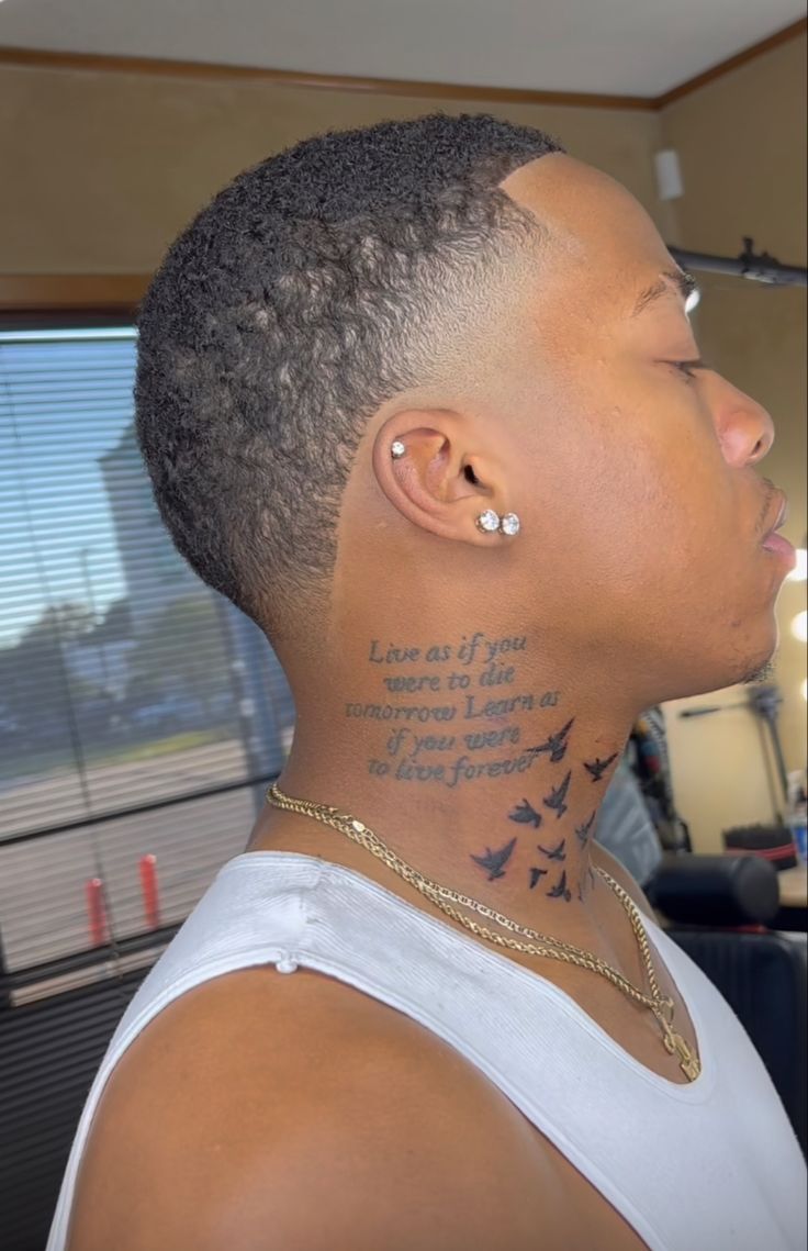 Unique Neck Tattoos For Men, Blonde Taper Fade, Men Tattoo Ideas With Meaning, Cool Neck Tattoos Men, Low Cut Fade Black Men, Buzz Cut Women Black, Short Hair Black Men, Taper Fade Black, Small Neck Tattoos Men