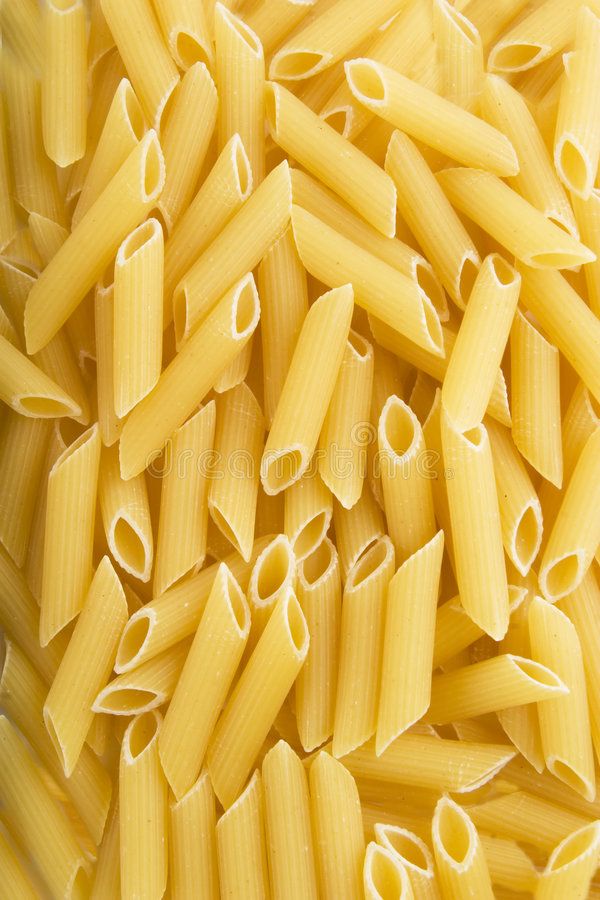 closeup of pasta noodles in yellow sauce stock photos, images and clippings