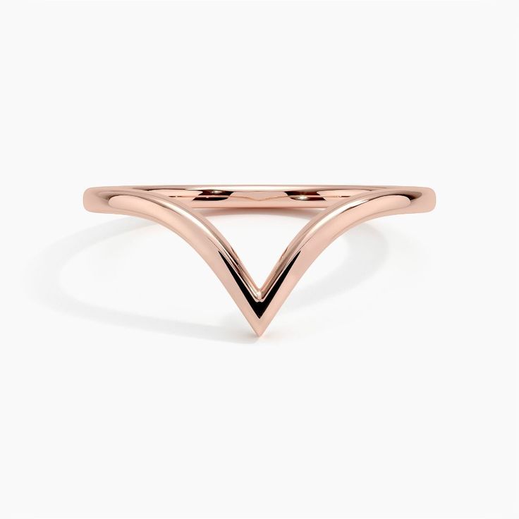 Nouveau Wedding Ring - 14K Rose Gold. This sleek ring forms a chevron-shaped band reminiscent of the Art Nouveau era and is made to sit flush and complement many engagement styles. Formal Rose Gold Rings With Tension Setting, Elegant Rose Gold Bands With Polished Finish, Elegant Rose Gold Band With Polished Finish, Formal Rose Gold Solitaire Stackable Rings, Modern Rose Gold Stackable Rings For Formal Occasions, Elegant Rose Gold Open Ring Bands, Classic Rose Gold Solitaire Stackable Rings, Modern Rose Gold Band With Polished Finish, Modern Rose Gold Bands With Polished Finish