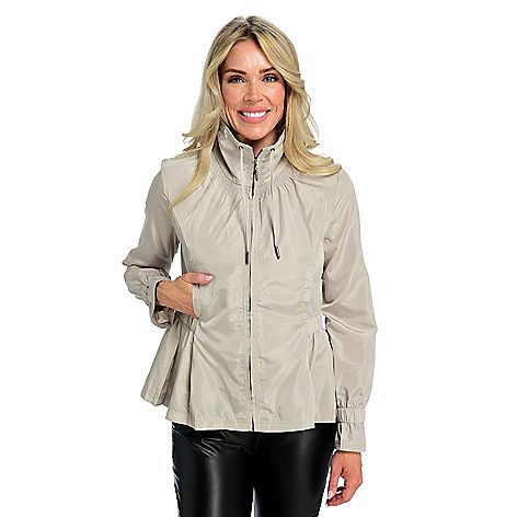 This lightweight mod x jacket makes transitioning from cool to warm weather so much easier and just as fashionable! This jacket features details that both flatter and make it comfortable to wear such as the elastic peplum waist (with pockets)  smocked neckline with drawstring and cuffed bell sleeves. Pair with a mod x legging and your favorite sneakers and you have the perfect on-the-go look! Chic Nylon Outerwear For Spring, Chic Spring Nylon Outerwear, Nylon Outerwear For Fall Layering, Nylon Outerwear For Layering In Fall, Versatile Nylon Outerwear For Fall, Long Sleeve Windbreaker For Fall Layering, Spring Nylon Outerwear For Work, Fall Nylon Outerwear For Layering, Fall Layering Nylon Outerwear