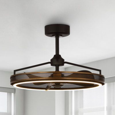 a light fixture in a room with windows