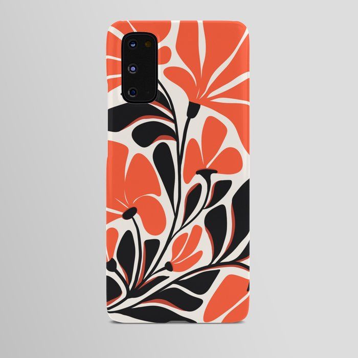 an orange and black floral phone case on a gray background with the back side open