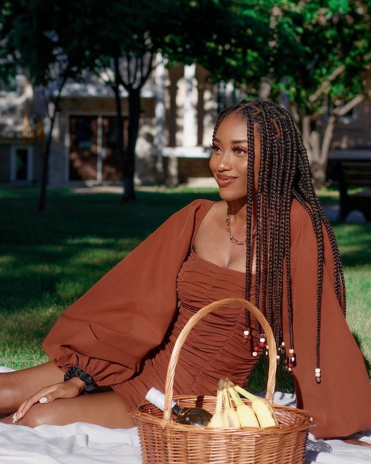 Golden hour black girl. Melanin. picnic. Knotless braids with beads style. Garden brunch. Brown aesthetic Braids Light Brown, Knotless Hairstyle, Black Woman With Braids, Brunch Outfit Black Woman, Black Woman Braids, Woman With Braids, Beaded Braids, Knotless Braids With Beads, Woman Braids