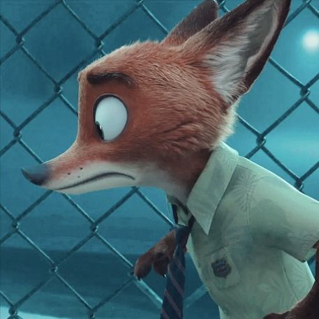 a fox wearing a shirt and tie standing in front of a fence