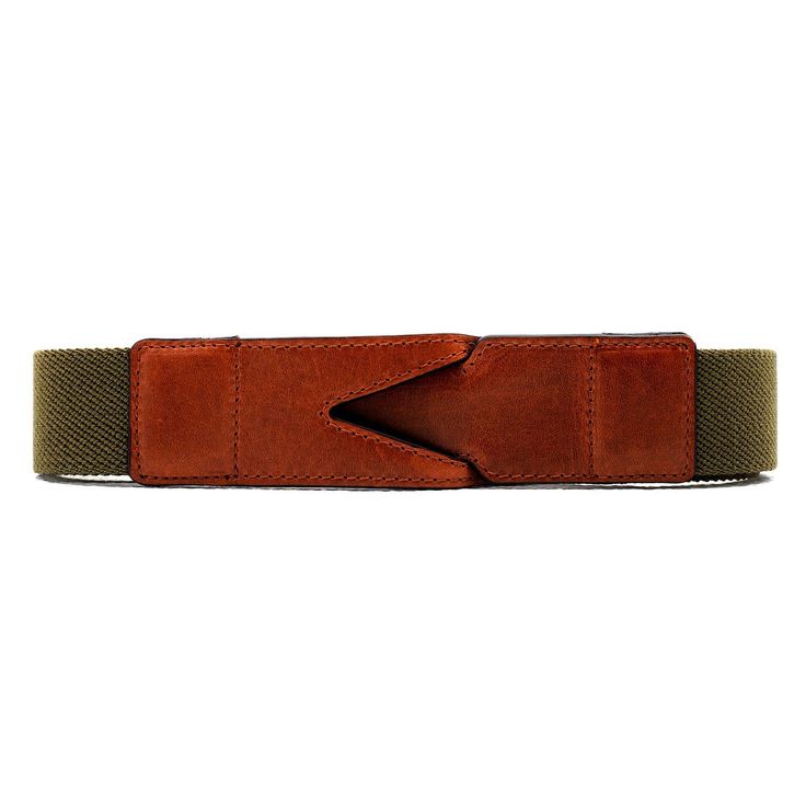 Cotton belt handmade in Spain by our artisans.  Made from vegetable-tanned leather, which will develop a beautiful patina as it ages and has a low environmental impact - unlike more common modern tanning processes. Can be personalised with initials. Color: Olive Green Size: S (90-95cm), M (100-105cm), L (110-115cm)* The belt is elastic, so it has a few centimeters of margin.  Designed for travel, the Branson belt is buckle-less so you can travel hassle-free through airport security checks. Craft Adjustable Brown Leather Belt, Adjustable Brown Belts And Suspenders For Everyday Use, Adjustable Brown Leather Belts And Suspenders, Modern Adjustable Brown Belt, Brown Leather Strap Belts For Everyday, Adjustable Brown Bridle Leather Belt, Brown Leather Strap Belt For Everyday Use, Brown Leather Belts For Everyday Use, Brown Adjustable Leather Strap Belt