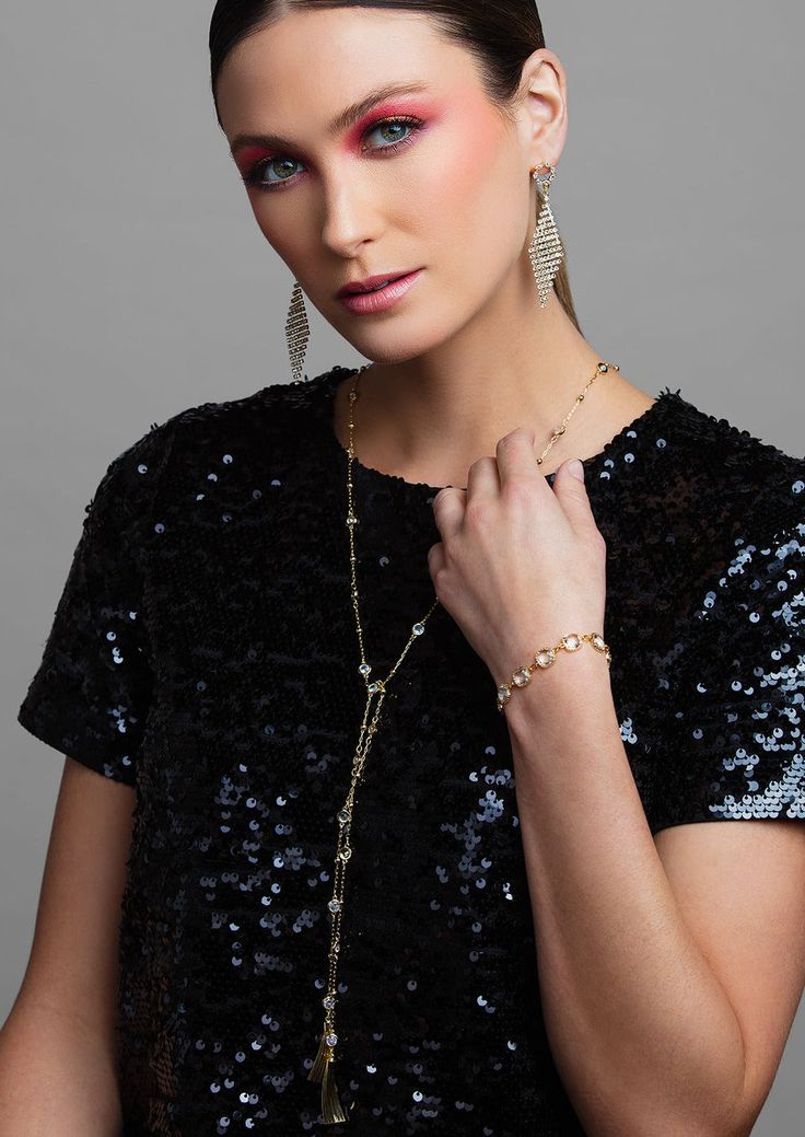 Wrap yourself in sparkle with the LONDON lariat necklace. This versatile necklace will be your go to necklace this season, and can be worn in a variety of ways. Layer it up or wear it in the back — the options are endless. Available in a bright silver or trendy gold, this multi-functional lariat necklace is perfect for any occasion. The necklace is completed with metal tassels at the end to a bit of drama and measures to 36 inches in length allowing you to style it in a variety of ways. Pink Emerald, Black Tie Affair, Black Hot Pink, Lariat Necklace, Luxury Accessories, Diamond Crystal, Crystal Bracelets, Gold And Silver, Black Tie