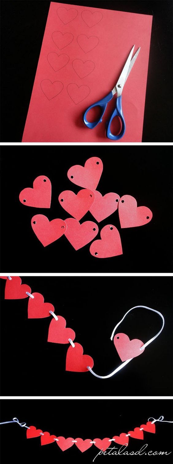 paper hearts are cut out to make a heart garland