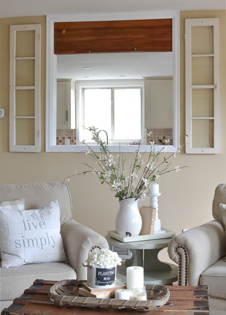 the living room is clean and ready to be used as a place for some flowers