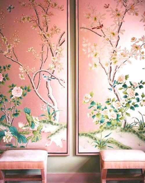 two paintings with flowers and birds on them in front of a pink wallpapered room