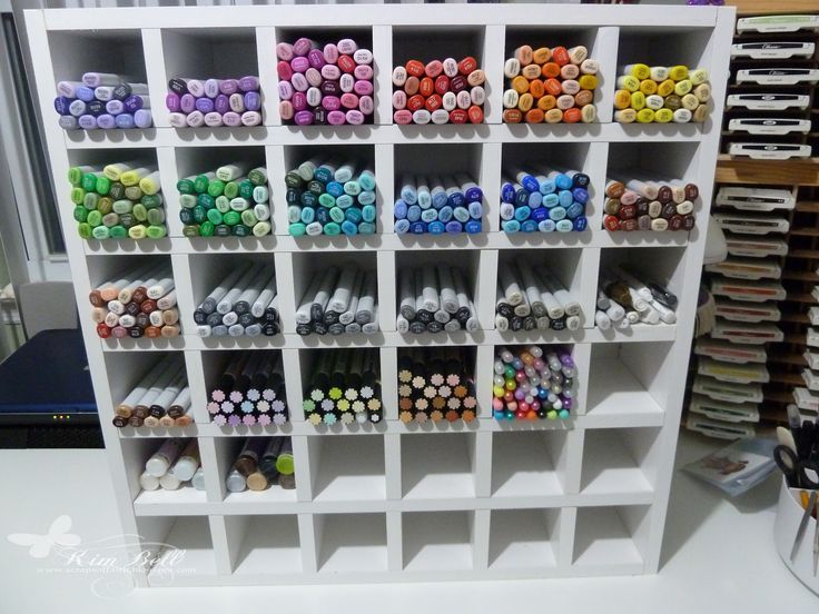 the shelves are filled with lots of different colored beads