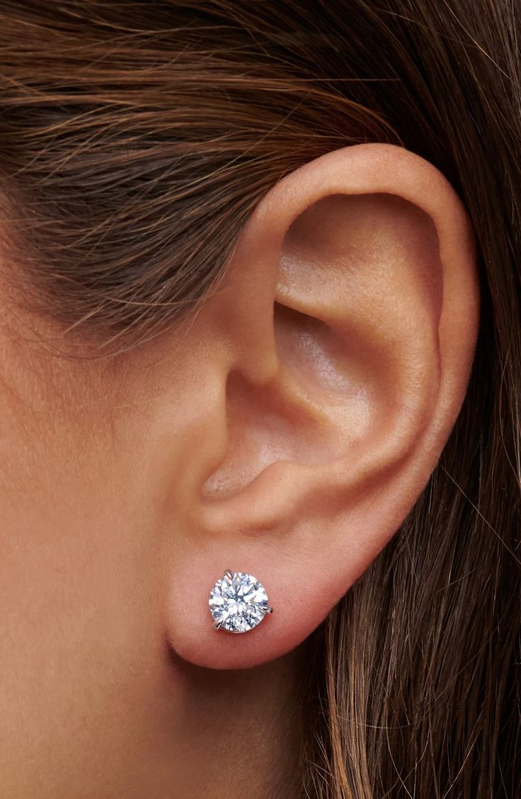 Bring timeless style to your evening look with these brilliant, round-cut diamond earrings designed to fit close to the ear for the illusion of floating gems.  Total diamond weight: 3.00ct. Color: I Clarity: SI2 Platinum/diamond Made in the USA >Diamond Guide Diamonds Earrings Studs, Classic Platinum Drop Earrings, Diamond White Lab Grown Diamond Earrings, Elegant Gia Certified Round Diamond Earrings, Dazzling Round Platinum Earrings, Dazzling Round-cut Lab Grown Diamond Earrings, Diamond White Brilliant Cut Round Earrings, Dazzling Round Cut Lab Grown Diamond Earrings, Dazzling Lab Grown Diamond Round Cut Earrings