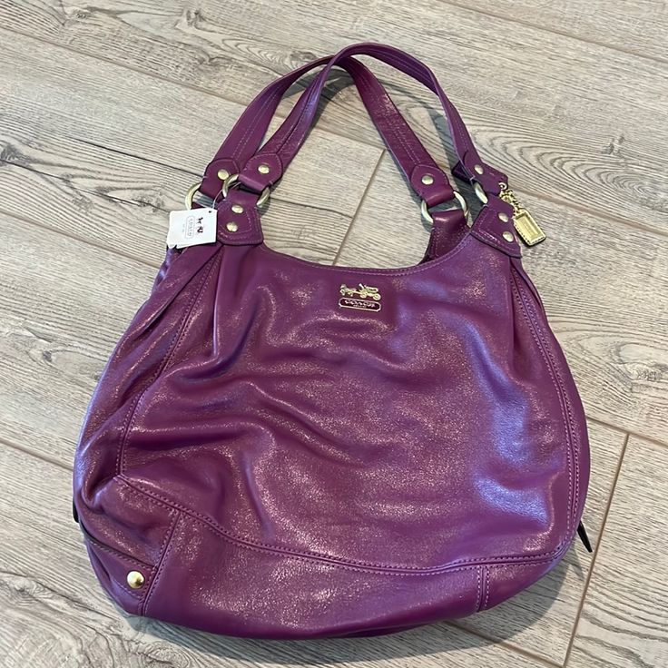 Vintage Coach Madison Maggie Bay In Plum. Never Used Before In Great Condition With Original Tags. Designer Coach Bag In Purple, Purple Hobo Bag For Shopping, Designer Purple Bag With Gold-tone Hardware, Designer Purple Bags With Gold-tone Hardware, Designer Purple Bags With Handles, Purple Hobo Bag With Double Handle For Shopping, Purple Double Handle Hobo Bag For Shopping, Designer Purple Shoulder Bag With Handles, Purple Designer Shoulder Bag