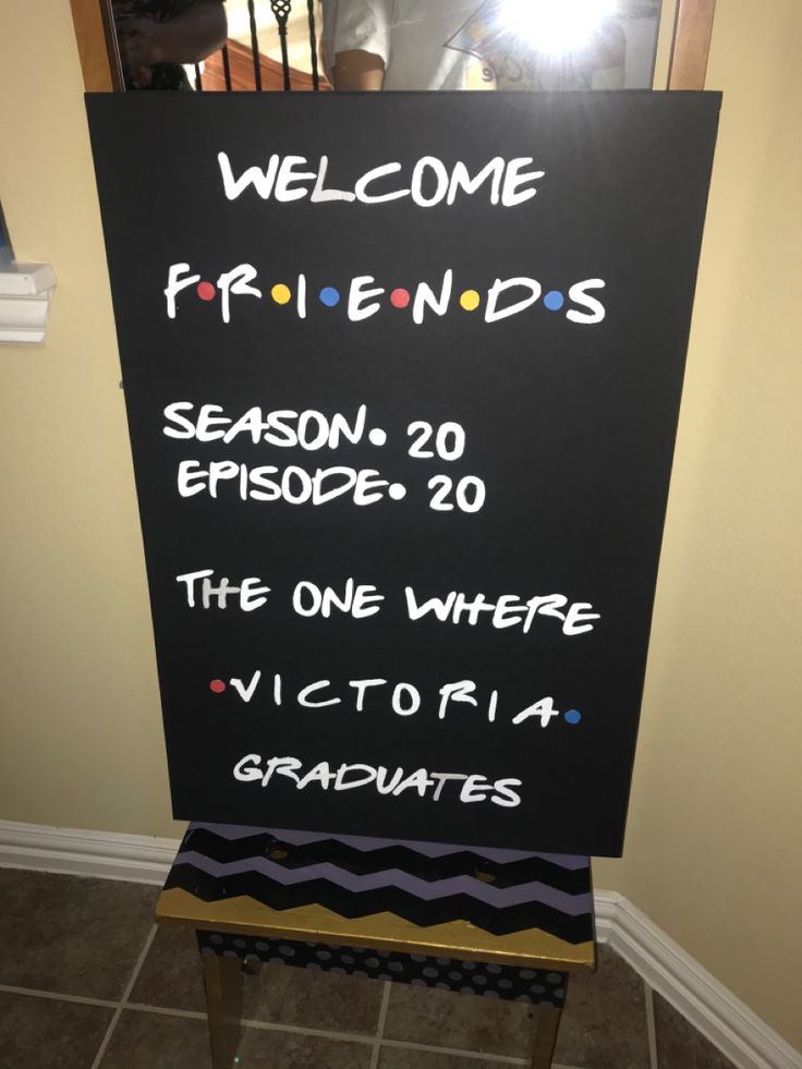 a welcome sign for friends in front of a door