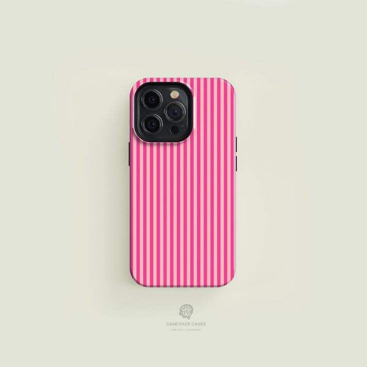 an iphone case with pink and white stripes on the back, against a gray background