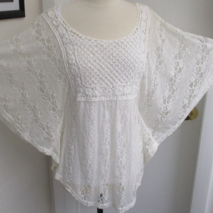 Style & Co. Sheer White Lace Tunic Top With Cami - Size Small New With Tags Material Is 97% Nylon, 3% Spandex Cami Is 100% Polyester Measures 29" Long; Shaw Sleeves Measure 12" Long At Top; Bust Measures Approx. 17" (While Lying Flat) Retail Price Is $49.50 White Stretch Bohemian Top, White Bohemian Stretch Top, White Crochet Top For Brunch, White Summer Crochet Top For Brunch, Summer White Crochet Top For Brunch, White Feminine Crochet Top For Beach, Feminine White Lace Top For Vacation, White Feminine Crochet Top For Brunch, White Crochet Lace Top For Brunch