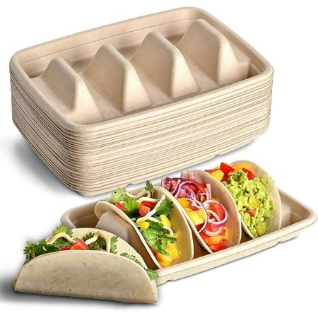 three burritos, one with lettuce and tomatoes on it next to a tray