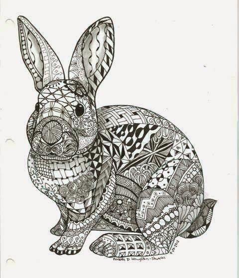 a black and white drawing of a rabbit with intricate patterns on it's body