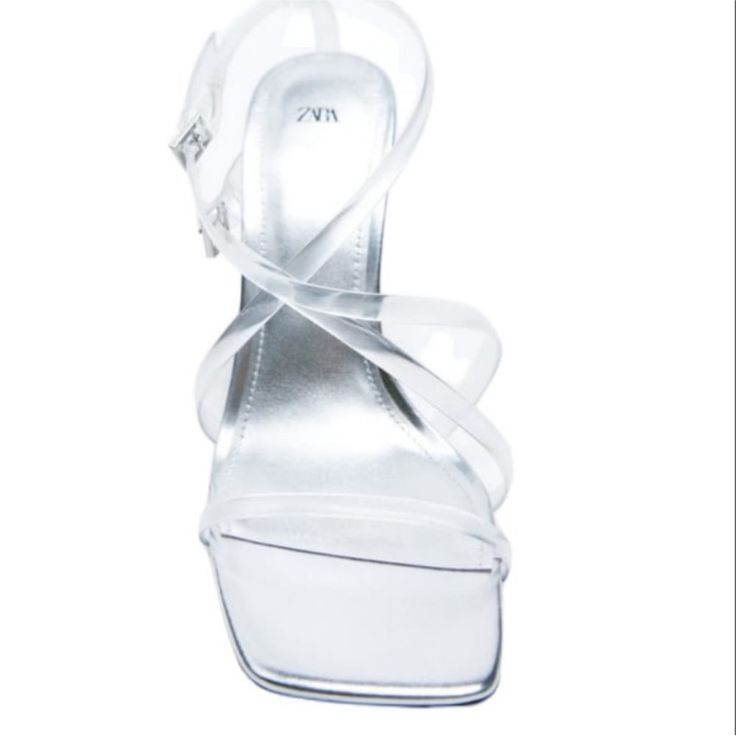 Zara Buckled Vinyl Heeled Sandals White High Heel Sandals With Clear Strap, White Open Toe Heels With Clear Strap, Chic Sandals With Transparent Straps And Block Heel, White Heels With Clear Strap For Party, White Party Heels With Clear Strap, Chic Sandals With Clear Strap And Block Heel, White Open Toe Sandals With Clear Strap, Summer High Heel Sandals With Transparent Straps, Clear Sandals With Heel Strap And Open Heel