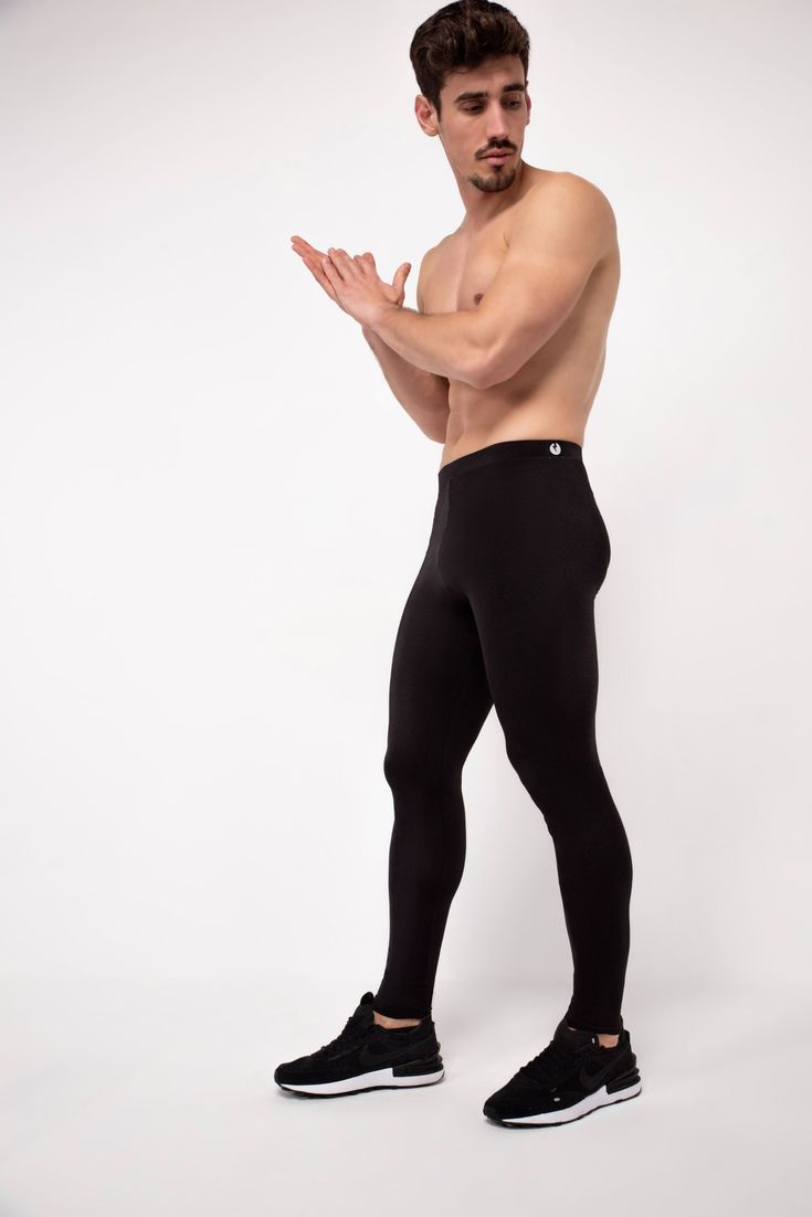 Description: Core Black Men's Leggings Breathable & Moisture Wicking 4-Way Super Stretch Fabric Machine Wash Cold, Quick Drying Durable Nylon / Spandex Bolt Logo Patch This design does not have pockets Model is 6’2’’ (189cm) tall, 34’’ (86cm) waist and wears size Large. Full-length Black Go-dry Tights, Full Length Go-dry Black Tights, Full Length Black Go-dry Tights, Functional Tight Bottoms, Black Stretchable Gym Pants, Elastic Black Gym Pants, Black 4-way Stretch Training Pants, Functional Tight Elastane Pants, Tight Functional Elastane Pants