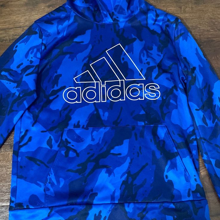 Brand New Blue Adidas Sweatshirt Blue Logo Print Sweatshirt For Spring, Blue Graphic Print Hoodie With Crew Neck, Blue Graphic Print Sportswear Hoodie, Blue Graphic Print Sweatshirt Sportswear, Casual Blue Hooded T-shirt, Blue Moisture-wicking Sweatshirt For Streetwear, Blue T-shirt For Winter Sports, Blue Logo Print Sweatshirt Athleisure Style, Blue Logo Print Sweatshirt In Athleisure Style